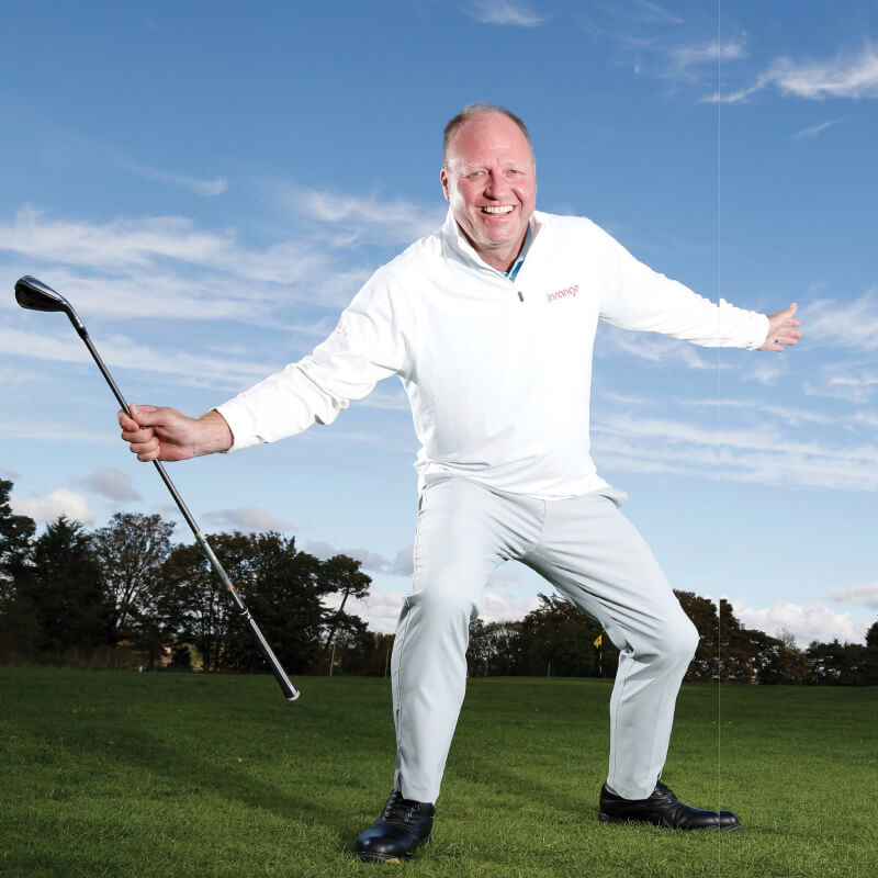 Reeves Weedon arms out holding a golf club
